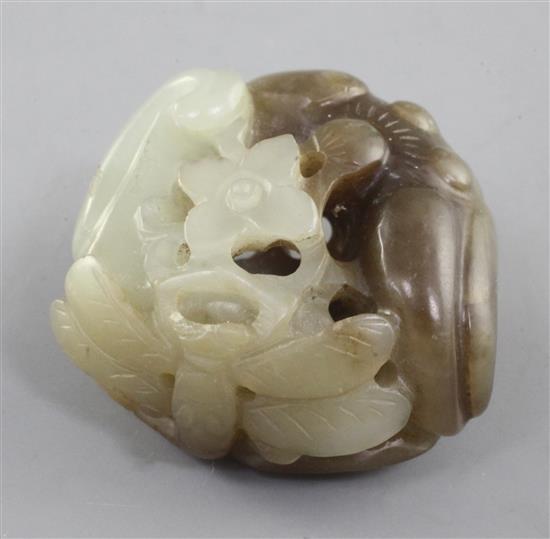 A Chinese pale celadon and brown jade carving of two bats and a dragonfly, 19th century, 3.7cm
